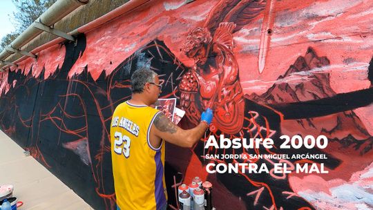 Absure 2000. San Miguel Arcángel y San Jordi haciendo el mal